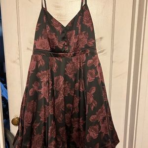 Black floral dress lined and petty coat underneath. Worn once to a quince.